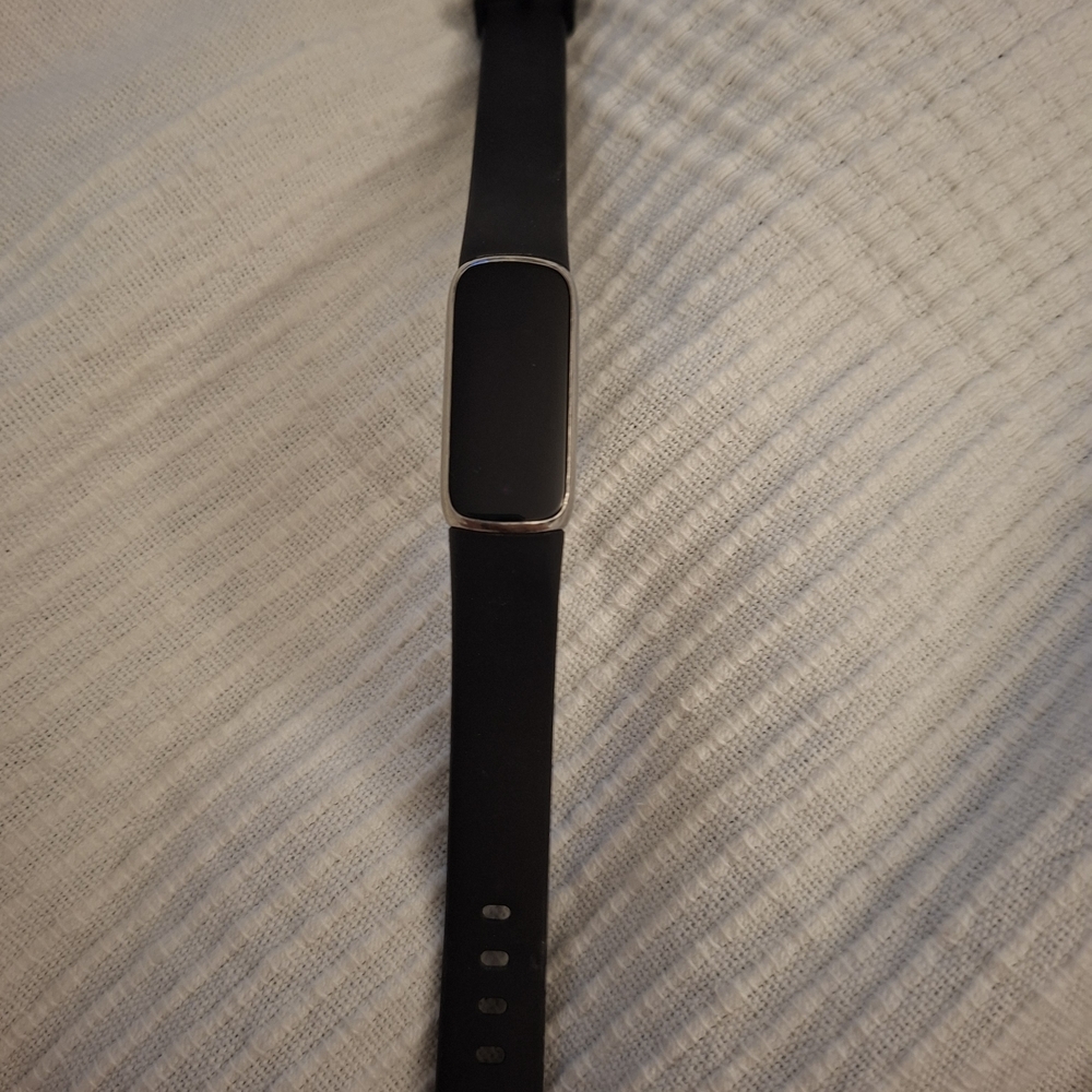 Black Fitness Tracker with Silver Accent